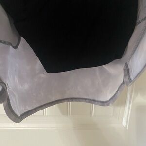 Gray marble print pull on polyester knit skirt with waist tie.